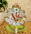 Handmade Ganesha idol, 14 cm tall, crafted from plastic, featuring vibrant colors and intricate details, perfect for home altar decor.
