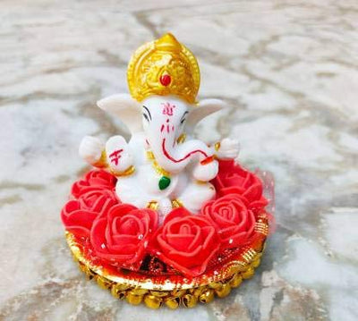 Handmade Ganesha idol crafted from premium marble, weighing 300 grams, measuring 10.16x10.16 cm, ideal for home altar or car décor, symbolizing wisdom and prosperity.