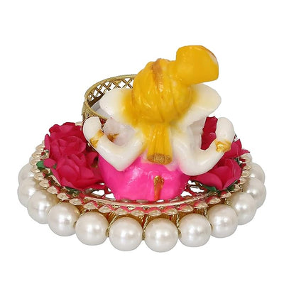 Handmade Ganesha idol made from durable resin, weighing 300 grams, measuring 8.5x7x8.5 cm, ideal for home altar or car décor, symbolizing wisdom and prosperity."