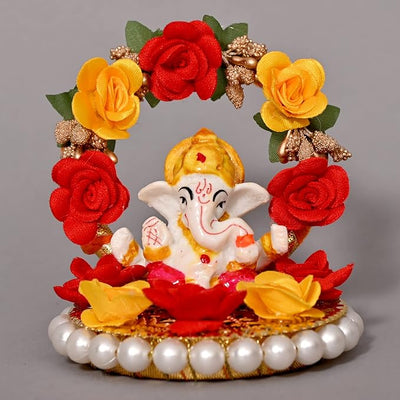 Handmade Ganesha idol crafted from high-quality resin, featuring intricate details, perfect for home and car decoration, symbolizing prosperity and wisdom.
