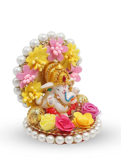 Handmade Ganesha idol crafted from durable resin, weighing 400 grams, measuring 8.5x8.5x11 cm, ideal for home altar or car décor, symbolizing wisdom and prosperity.