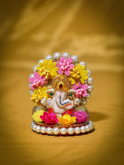 Handmade Ganesha idol crafted from durable resin, weighing 400 grams, measuring 8.5x8.5x11 cm, ideal for home altar or car décor, symbolizing wisdom and prosperity.