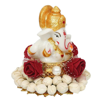 Handmade Ganesha idol crafted from durable resin, weighing 400 grams, measuring 8x8x8 cm, ideal for home altar or car décor, symbolizing wisdom and prosperity.