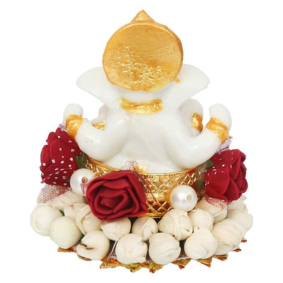 Handmade Ganesha idol crafted from durable resin, weighing 400 grams, measuring 8x8x8 cm, ideal for home altar or car décor, symbolizing wisdom and prosperity.