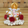 Handmade Ganesha idol crafted from durable resin, weighing 400 grams, measuring 8x8x8 cm, ideal for home altar or car décor, symbolizing wisdom and prosperity.