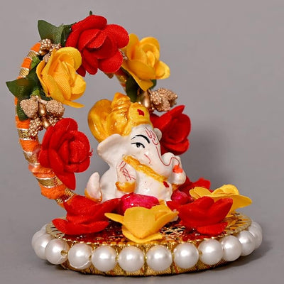 Handmade Ganesha idol crafted from high-quality resin, featuring intricate details, perfect for home and car decoration, symbolizing prosperity and wisdom.