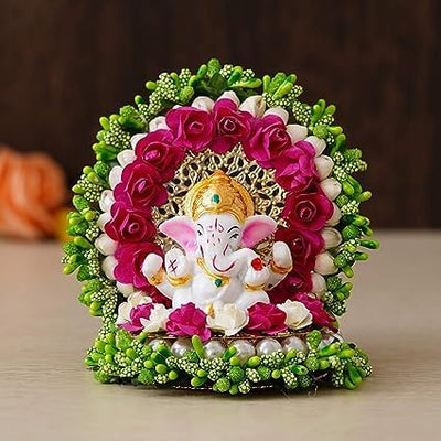 Handmade Ganesha idol made from durable resin, 600 grams, compact 15x10x15 cm size, perfect for home altar or car décor, symbolizing wisdom and prosperity.