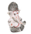 Handmade Ganesha idol in resin for car dashboard, measuring 5.1 cm x 5.1 cm x 7.6 cm, ideal for bringing blessings and positivity while driving