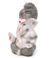 Handmade Ganesha idol in resin for car dashboard, measuring 5.1 cm x 5.1 cm x 7.6 cm, ideal for bringing blessings and positivity while driving