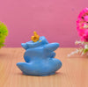 Handmade Ganesha idol in resin for car dashboard, measuring 5.1 cm x 5.1 cm x 7.6 cm, perfect for bringing blessings on the road