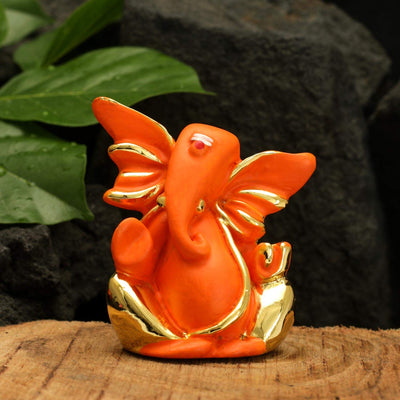 Handmade ceramic Ganesha idol, measuring 7L x 5W x 8H cm, symbolizing wisdom and prosperity, ideal for home decor and altars."