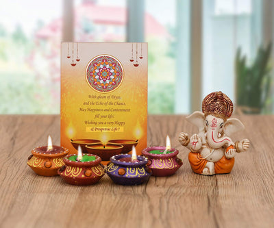 "Handmade resin Ganesha idol for car dashboard, measuring 6.4L x 3.8W x 7.6H cm, symbolizing blessings and protection during travel."