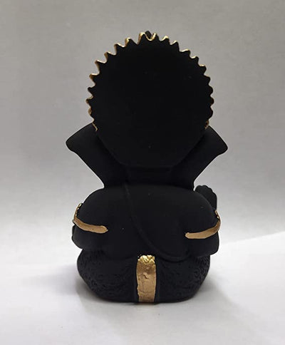 Handmade Ganesha idol in resin, symbolizing prosperity and wisdom, perfect for home altar or car dashboard.