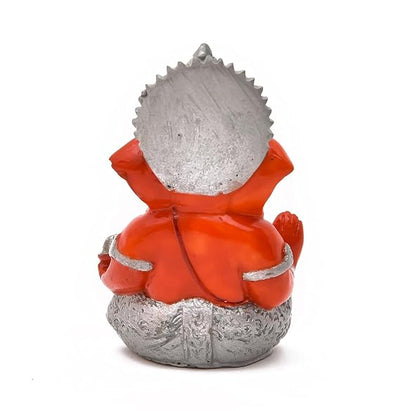 Handmade Ganesha idol in resin for car dashboard, measuring 5.1 cm x 5.1 cm x 7.6 cm, designed to bring blessings and positivity while driving