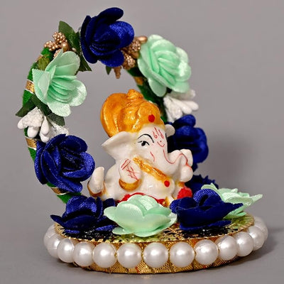 Handmade Ganesha Idol in resin, symbolizing prosperity and wisdom, perfect for home or car decoration
