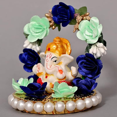 Handmade Ganesha Idol in resin, symbolizing prosperity and wisdom, perfect for home or car decoration