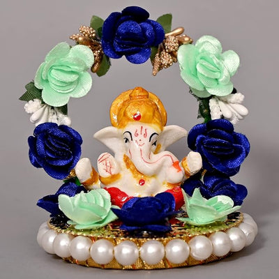 Handmade Ganesha Idol in resin, symbolizing prosperity and wisdom, perfect for home or car decoration