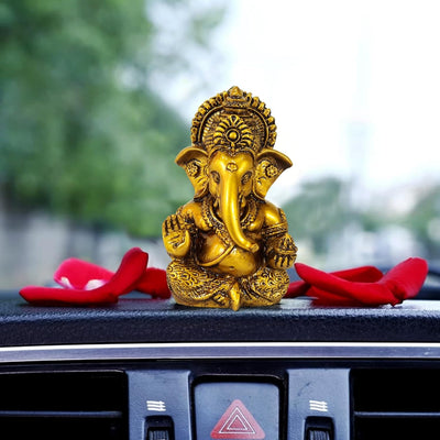 Handmade Ganesha idol in resin, measuring 9.3 cm, perfect for home altars and car dashboards.