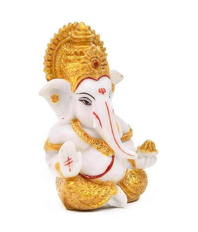 Handmade Ganesha idol in resin for car dashboard, measuring 5.1 cm x 5.1 cm x 7.6 cm, perfect for bringing blessings and positivity while driving