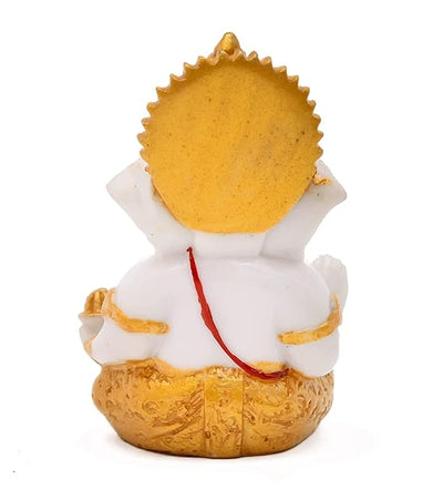 Handmade Ganesha idol in resin for car dashboard, measuring 5.1 cm x 5.1 cm x 7.6 cm, perfect for bringing blessings and positivity while driving