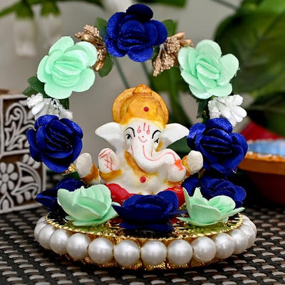 Handmade Ganesha Idol in resin, symbolizing prosperity and wisdom, perfect for home or car decoration