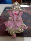 Handmade Ganesha idol in synthetic resin, symbolizing wisdom and prosperity, perfect for altar or car dashboard display.