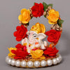 Handmade Ganesha idol crafted from high-quality resin, featuring intricate details, perfect for home and car decoration, symbolizing prosperity and wisdom.