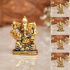 "Handmade Ganesha idol in metal for car dashboard, featuring intricate details and a polished finish, perfect for inviting blessings on every journey."