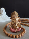 "Handmade Ganesha idol in resin for car dashboard, featuring intricate details and vibrant colors, perfect for inviting blessings on every journey."