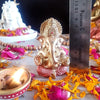"Handmade Ganesha idol in resin for car dashboard, featuring intricate details and vibrant colors, perfect for inviting blessings on every journey."