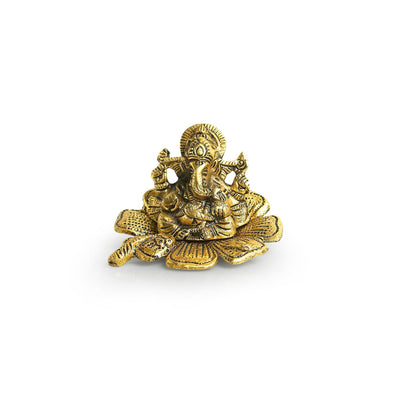 "Handmade Ganesha idol showpiece in aluminum, featuring intricate details, perfect for home decor, altars, or as a thoughtful gift."