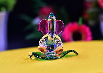 Handmade 400g glass Ganesha idol for car dashboard or home altar, symbolizing wisdom, prosperity, and peace in Hinduism.