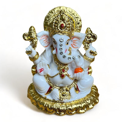 Handmade marble Ganesha idol, beautifully crafted, depicting Lord Ganesha in a serene pose, ideal for home decor and spiritual blessings."