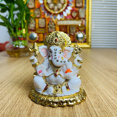 Handmade marble Ganesha idol, beautifully crafted, depicting Lord Ganesha in a serene pose, ideal for home decor and spiritual blessings."