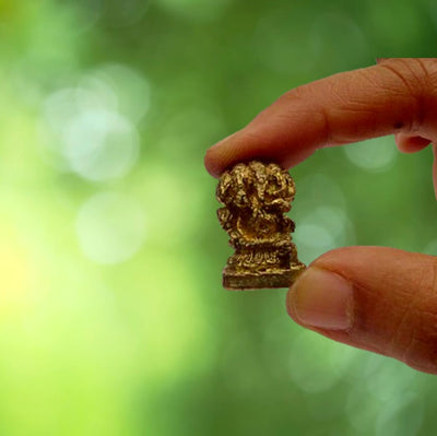 "Handmade metal Ganesha idol, 140g, 3.30×1.52×1.02 cm, intricately crafted by Indian artisans, perfect for home altars or as a collectible gift."