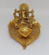 Handmade metal Ganesha idol, ideal for home decor and altar, symbolizing blessings and positivity