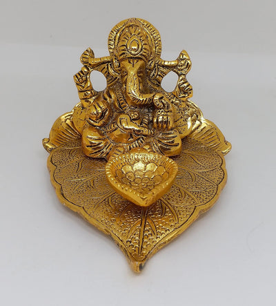 Handmade metal Ganesha idol, ideal for home decor and altar, symbolizing blessings and positivity