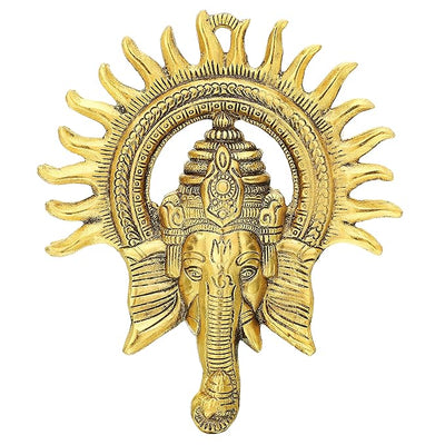 Handmade metal Ganesha wall hanging, ideal for altar or home decor, symbolizing blessings and positivity.