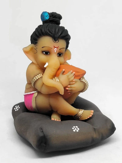 Handmade 550g resin Ganesha idol for car dashboard or home altar, symbolizing wisdom, prosperity, and success in Hinduism.