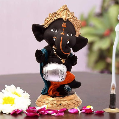 Handmade resin Ganesha idol, 600 grams, measuring 6.2x3x3 cm, symbolizing good luck, success, and prosperity, ideal for home altar or gifting."