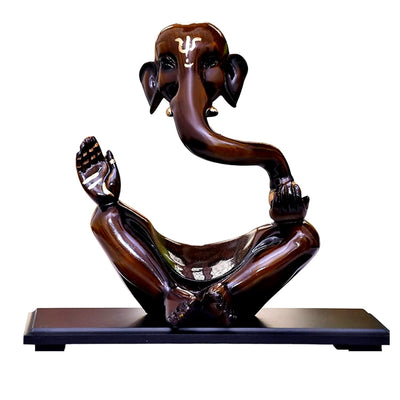 Handmade resin Ganesha idol showpiece, perfect for altar or home decor, symbolizing prosperity and blessings