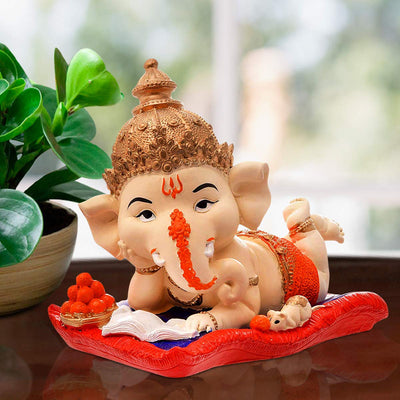 Handmade resin Ganesha idol, beautifully crafted showpiece symbolizing wisdom and prosperity, perfect for home decor