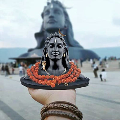 A handmade Shiva idol made from synthetic rubber, showcasing intricate details and vibrant colors, suitable for altars and home decor.
