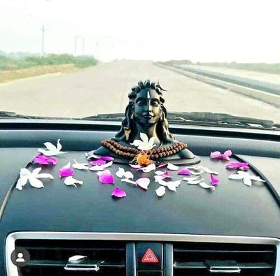 A handmade Shiva idol made from synthetic rubber, showcasing intricate details and vibrant colors, suitable for altars and home decor.