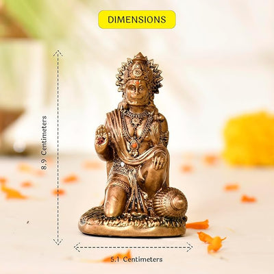 "Handmade resin idol of Lord Hanumanji, featuring intricate details and a vibrant finish, measuring 5.1 L x 4 W x 8.9 H centimeters. Ideal for car dashboards, home decor, and puja rooms, symbolizing protection and strength."