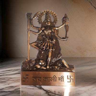 Handmade metal Kali Mata statue, intricately designed, showcasing her four arms and iconic features, ideal for spiritual spaces.