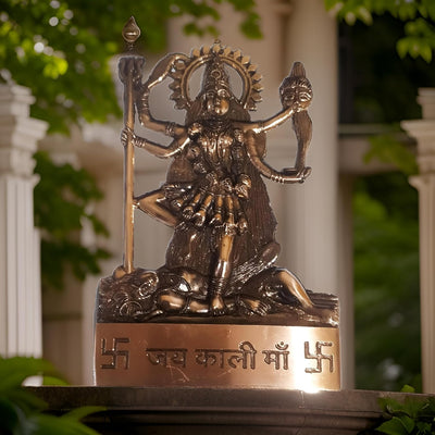 Handmade metal Kali Mata statue, intricately designed, showcasing her four arms and iconic features, ideal for spiritual spaces.