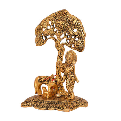 Exquisite Kamadhenu cow statue crafted from metal with a golden finish, symbolizing wealth and abundance in Hindu culture.