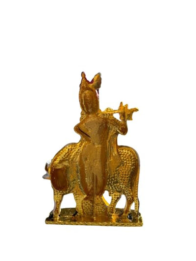 Brass statue of Lord Krishna with a cow, handcrafted by Indian artisans, symbolizing divine love and spirituality.