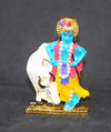 Handmade brass idol of Lord Krishna with the Kamadhenu cow, featuring intricate details, ideal for home altar or decor